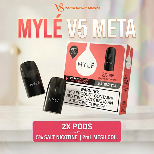 MYLE V5 META 2x pods disposable vape packaging and two black vape pods shown on a light background, with text indicating peach mango flavor, 5% salt nicotine, and 2mL mesh coil.