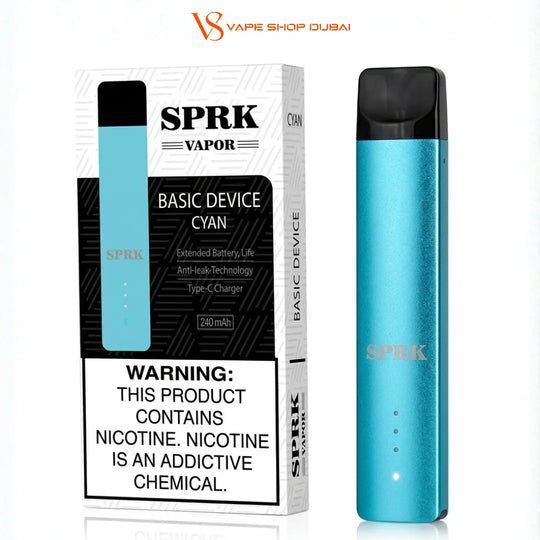 A turquoise blue metallic SPRK Vapor disposable vape device next to its retail packaging box, featuring a prominent nicotine warning label on the front.