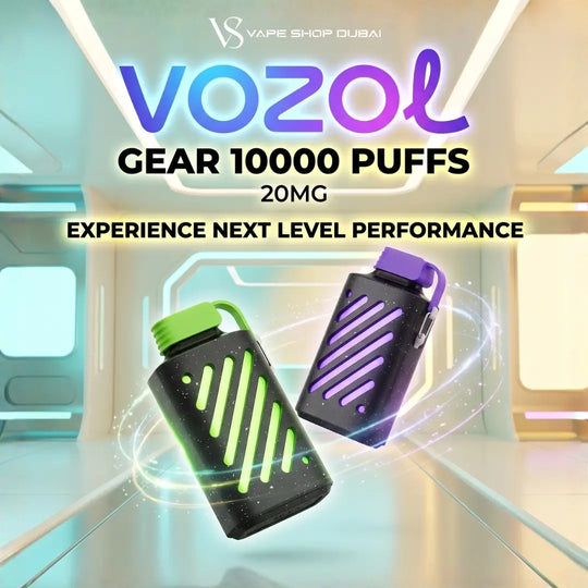 Two Vozol vape devices floating in a futuristic interior setting. One device is black with a bright green mouthpiece and green diagonal stripe pattern.