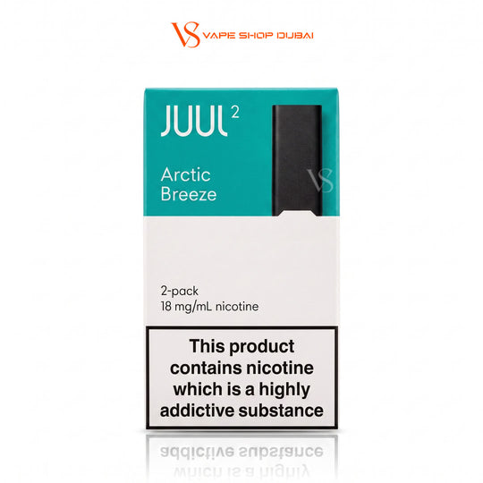 A JUUL 2 Arctic Breeze 2-pack disposable vape box on a white background with a reflection. The packaging features a teal top section with white text and a black vape device graphic, and a white lower section with a black warning label.