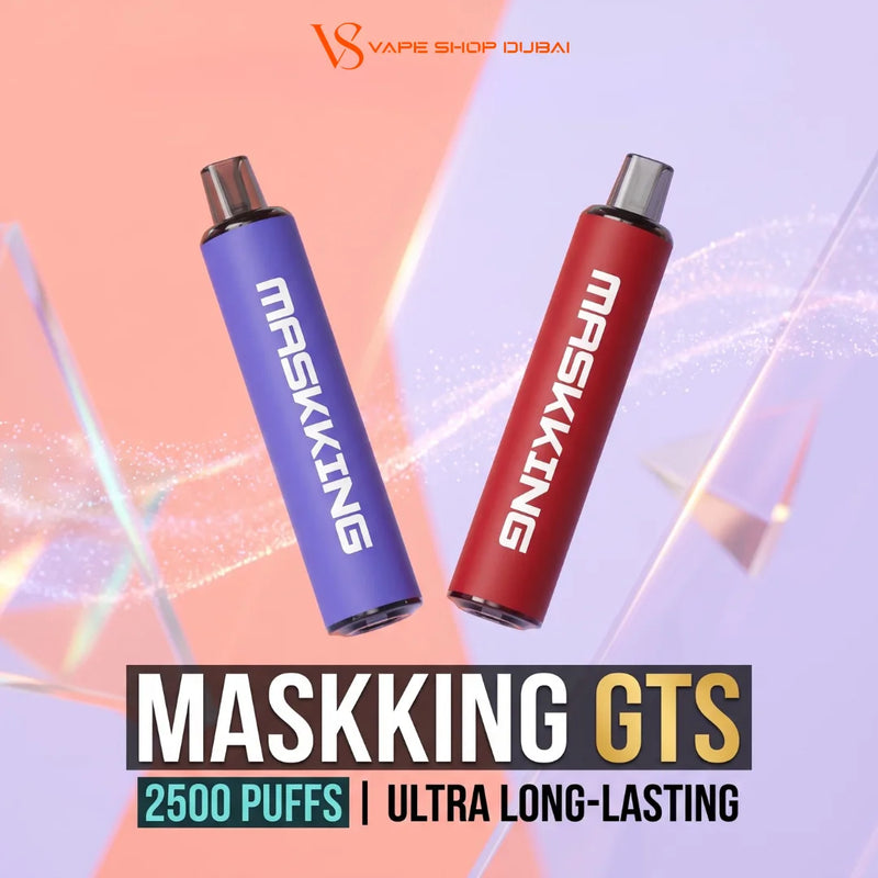 Two vape devices, one purple and one red, both branded MASKKING, floating against a pastel pink, orange, and lavender graphic background with text overlays reading MASKKING GTS, 2500 PUFFS, and ULTRA LONG-LASTING. The top of the image features the 'VS VAPE SHOP DUBAI' logo.