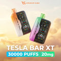 Two Tesla Bar XT disposable vape devices floating against a cloudy sky background. One vape has a white-to-orange gradient body with a black display panel, and the other has a pink-to-green gradient body with a black display panel.