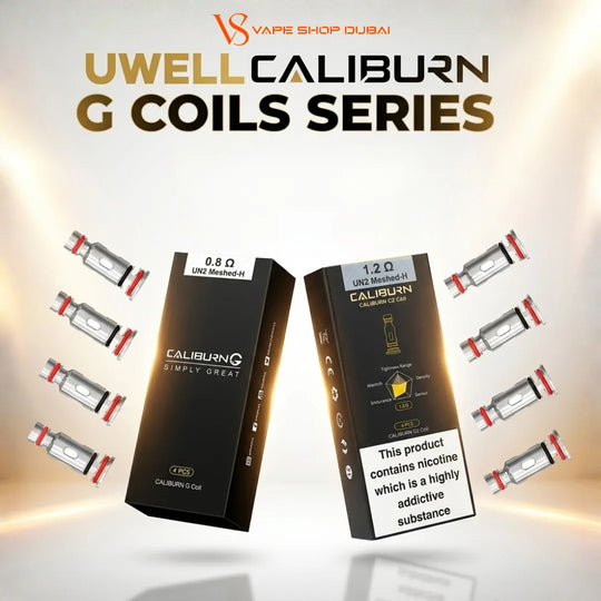 Promotional graphic for UWELL Caliburn G Coils Series by VS Vape Shop Dubai, showing two black product boxes with white and gold text, surrounded by multiple small coil packs on a glowing beige-to-white gradient background.