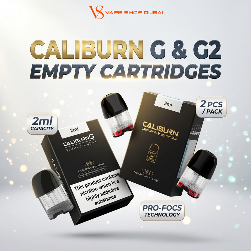 Caliburn G & G2 empty cartridges by VS Vape Shop Dubai, shown with black retail boxes and clear disposable pods on a light sparkly background. Text highlights 2ml capacity, 2 pieces per pack, and Pro-Focus Technology.