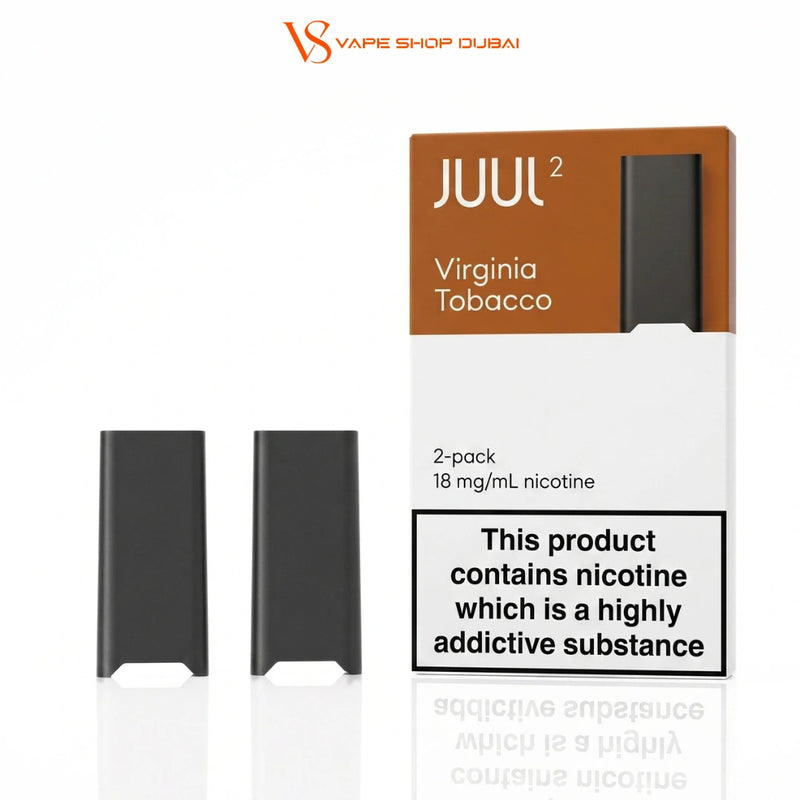 Juul 2 Virginia Tobacco 2-pack disposable vape pods shown with their retail box on a white background. The box is brown and white with a prominent nicotine warning label, and two dark gray vape pods are displayed to the left.