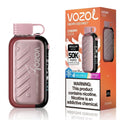 Vozol GEAR Ice & Sweet Cherry Cola disposable vape device next to its orange retail packaging box, featuring a metallic rose gold body with dark red accents and a pink mouthpiece.
